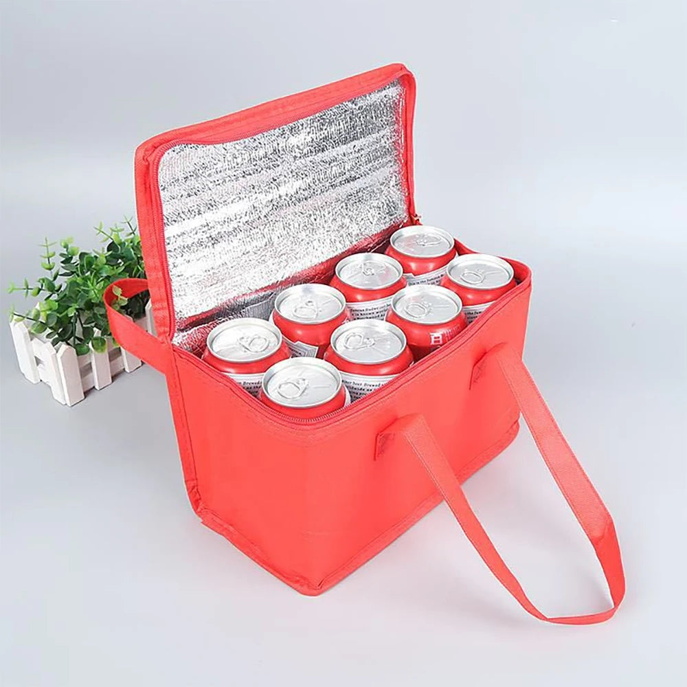 Red insulated cooler bag with six silver cans on a light gray background