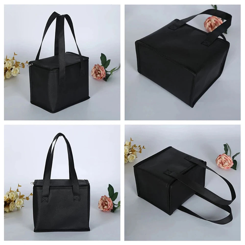 Black insulated lunch bag shown from multiple angles on a light gray background with flowers.