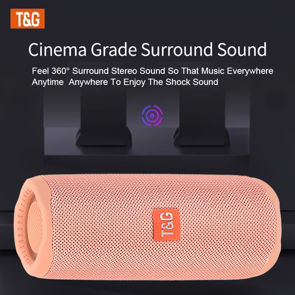 Pink speaker with T&G logo on a dark background, featuring text about cinema grade surround sound.