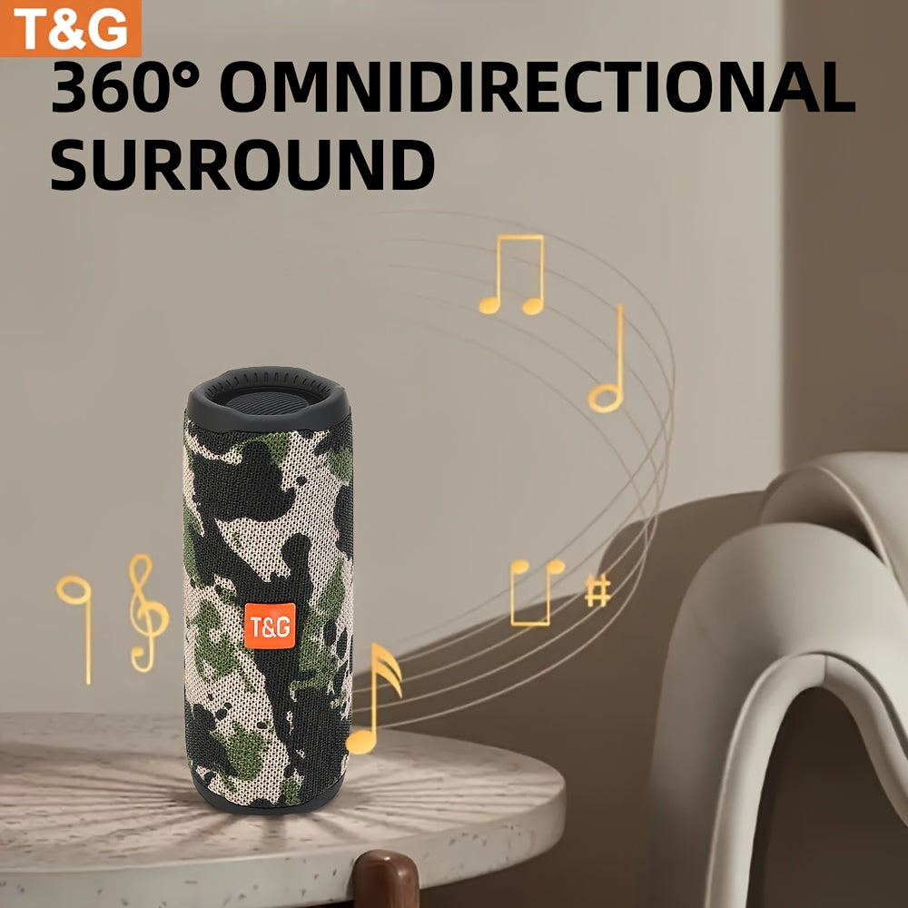 Camouflage-patterned Bluetooth speaker with T&G branding on a wooden surface.