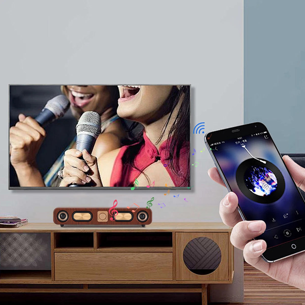 Smartphone controlling a music app displayed on a TV screen with a person holding a microphone.