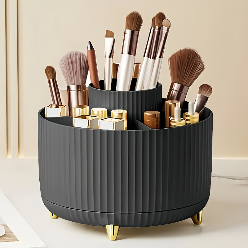 Black cylindrical makeup organizer with various brushes and containers on a light background