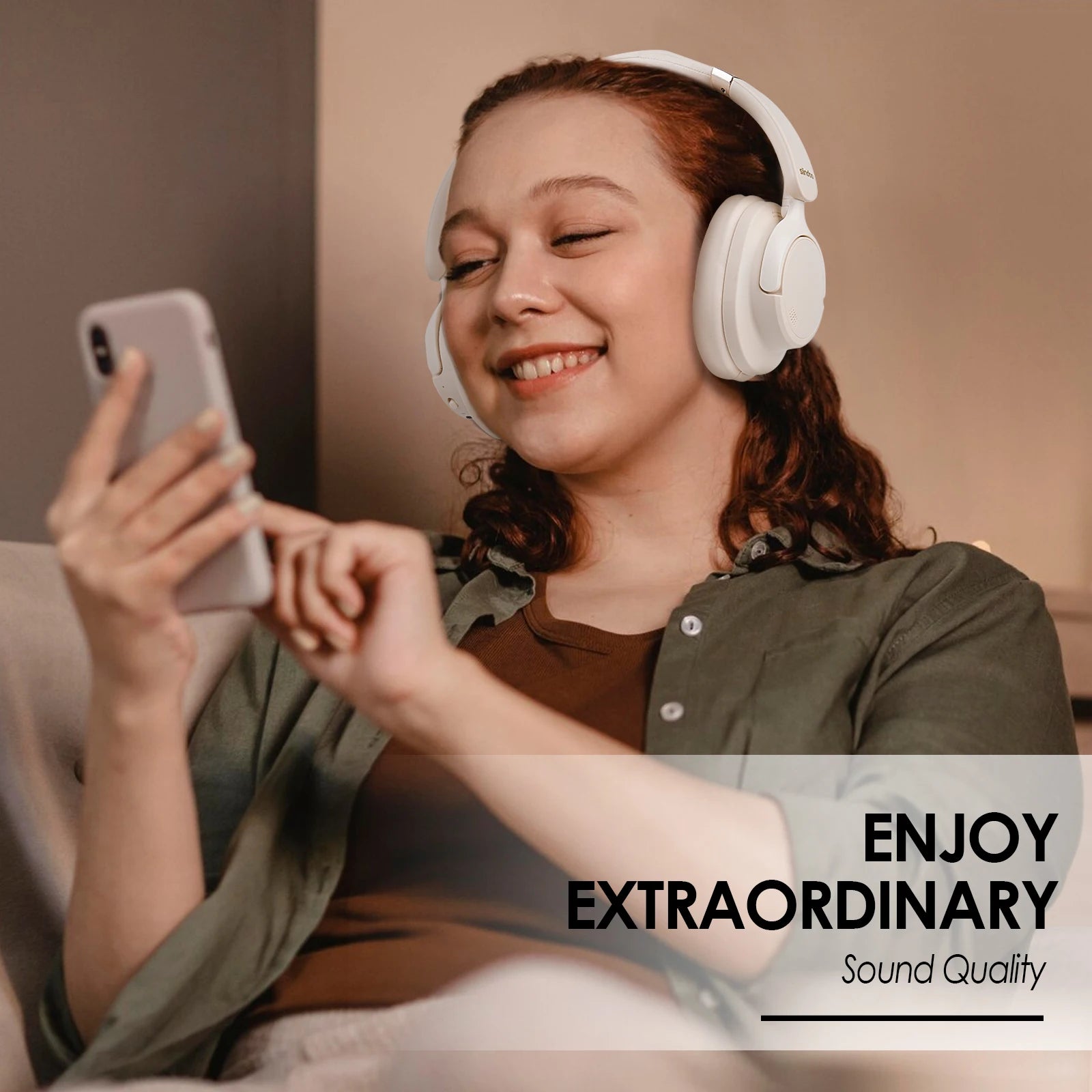 Person wearing headphones and using a phone with text 'Enjoy Extraordinary Sound Quality'.