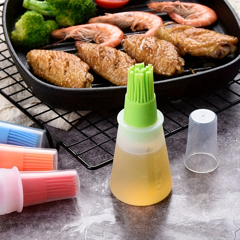 Basting brush with green silicone head on a gray surface with food in the background