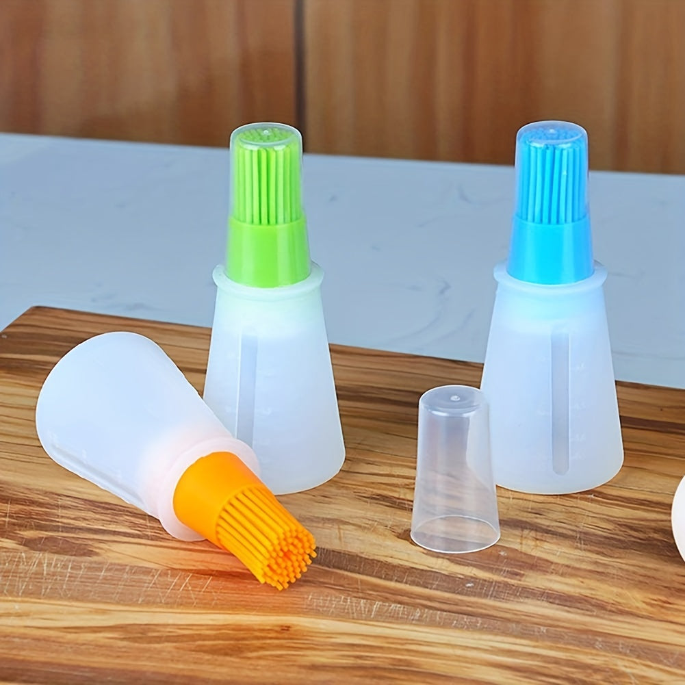 Set of silicone basting brushes with colorful handles on a wooden surface.