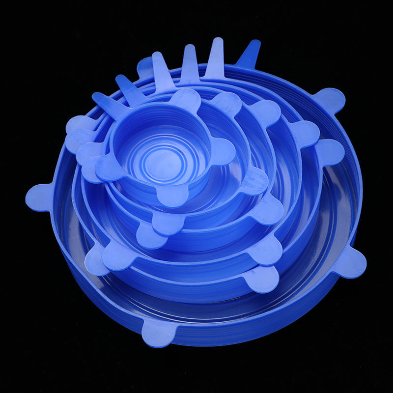 Blue silicone lid with textured design on a black background