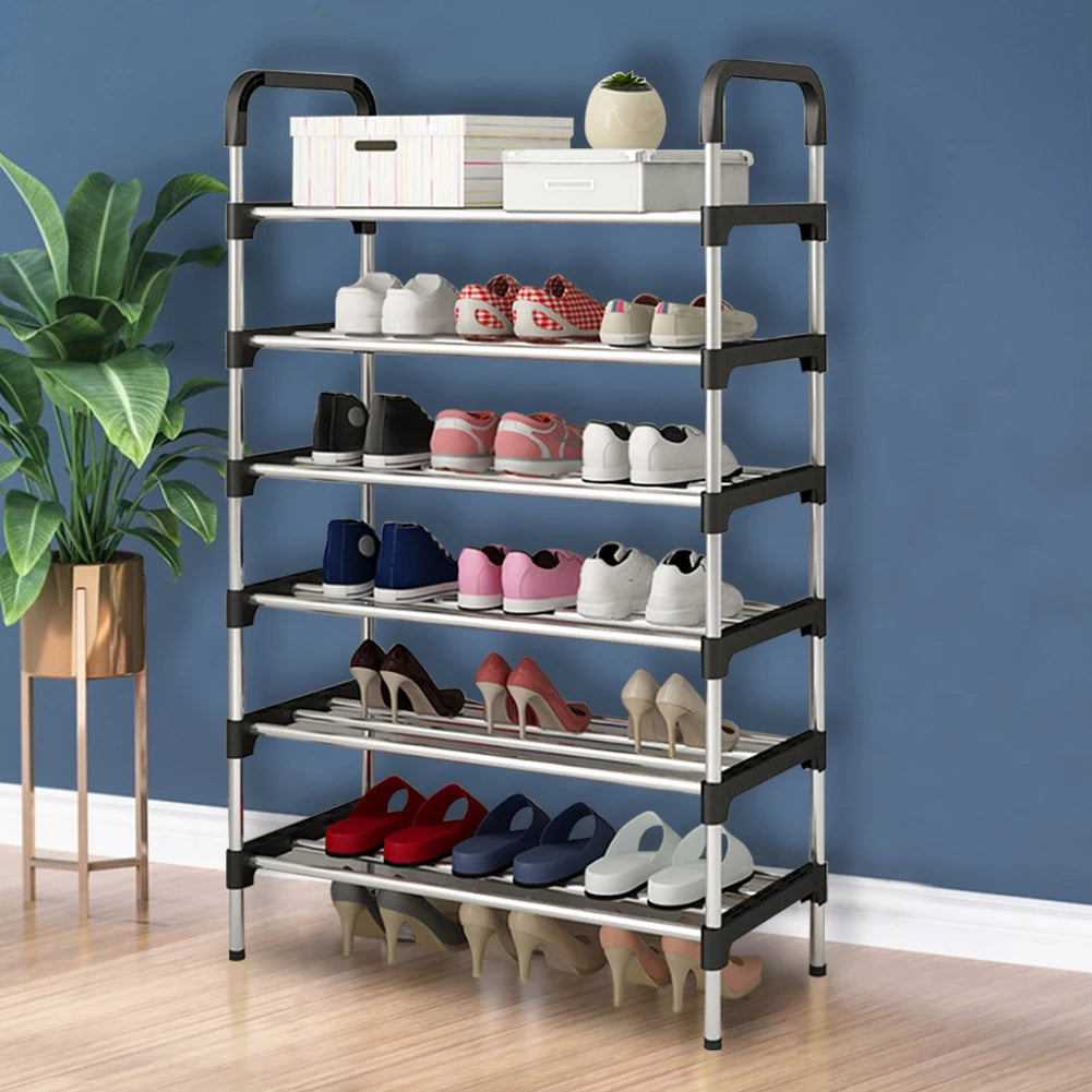Multi-tiered shoe rack with shoes against a blue wall