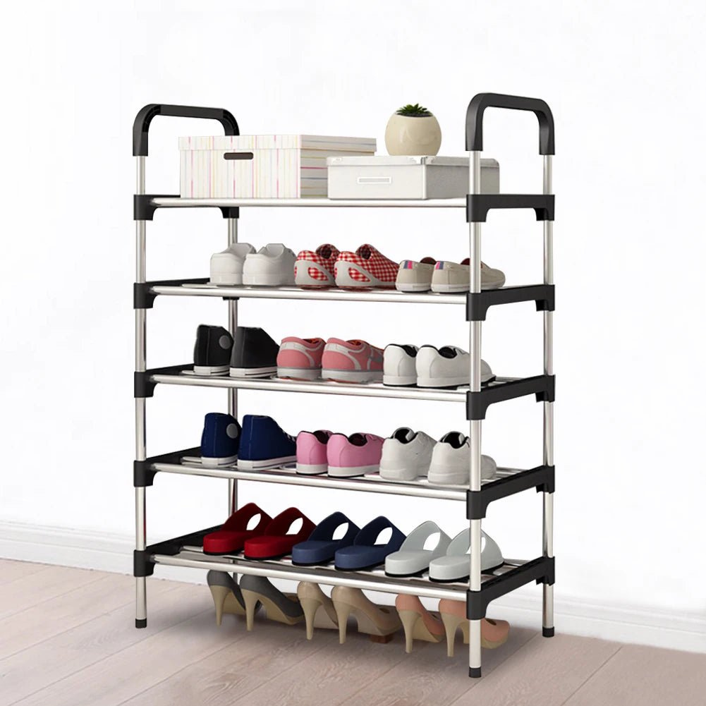 Multi-tiered shoe rack with various shoes on a white background