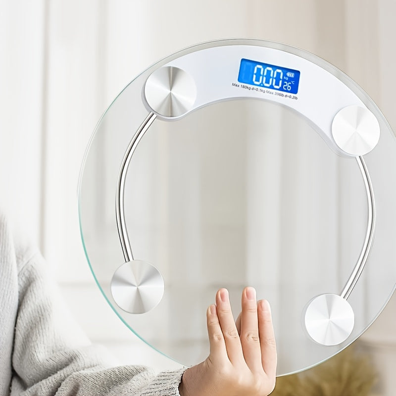 Digital body fat scale with a person's hand on it, displaying a blurred background.