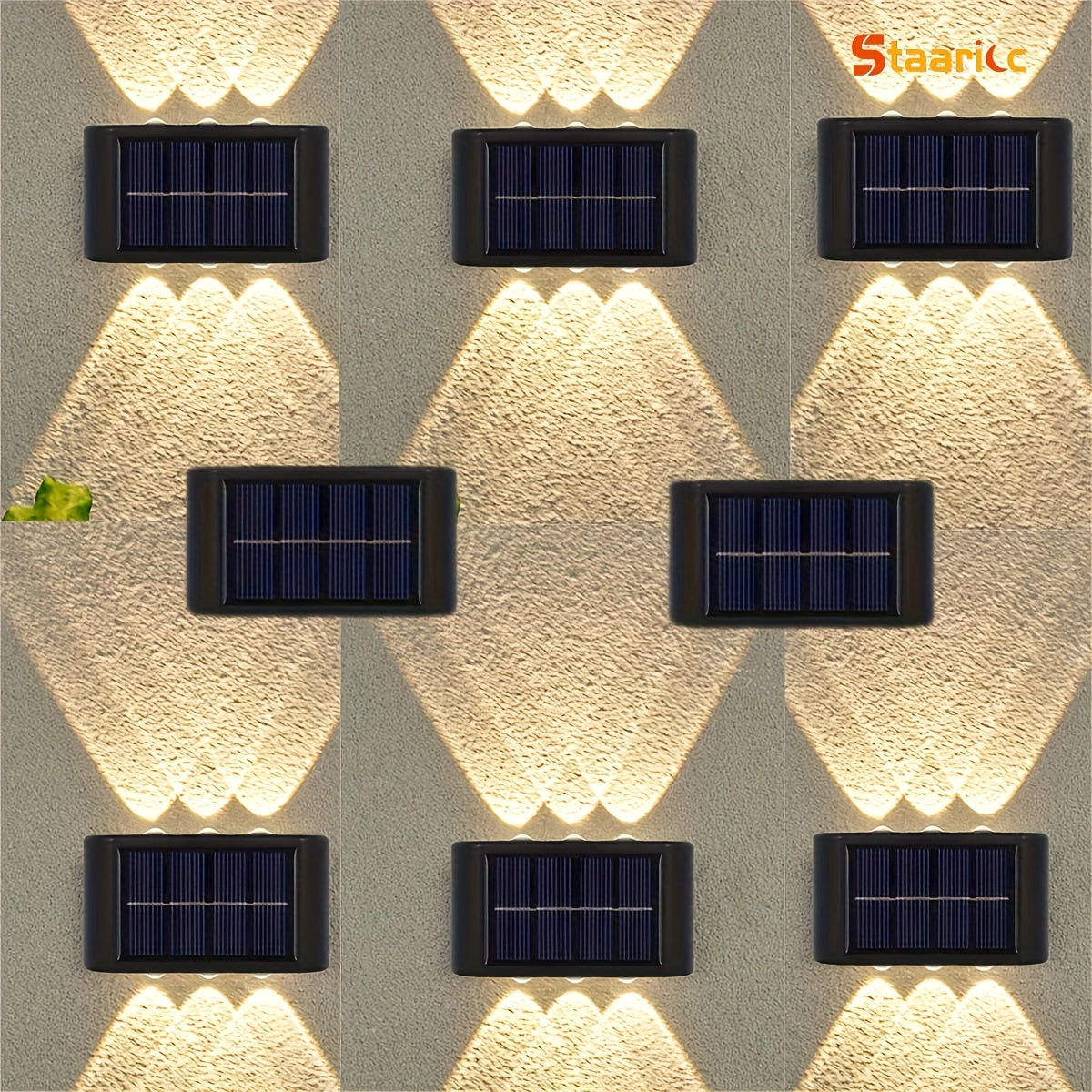 Solar wall lights on a textured wall with Staarcc branding.