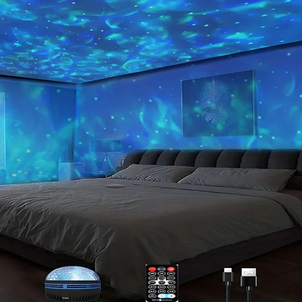 Bedroom with starry night light projector on a bed, displaying blue and green colors.