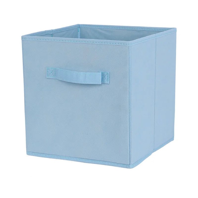 Light blue storage box with a handle on a white background