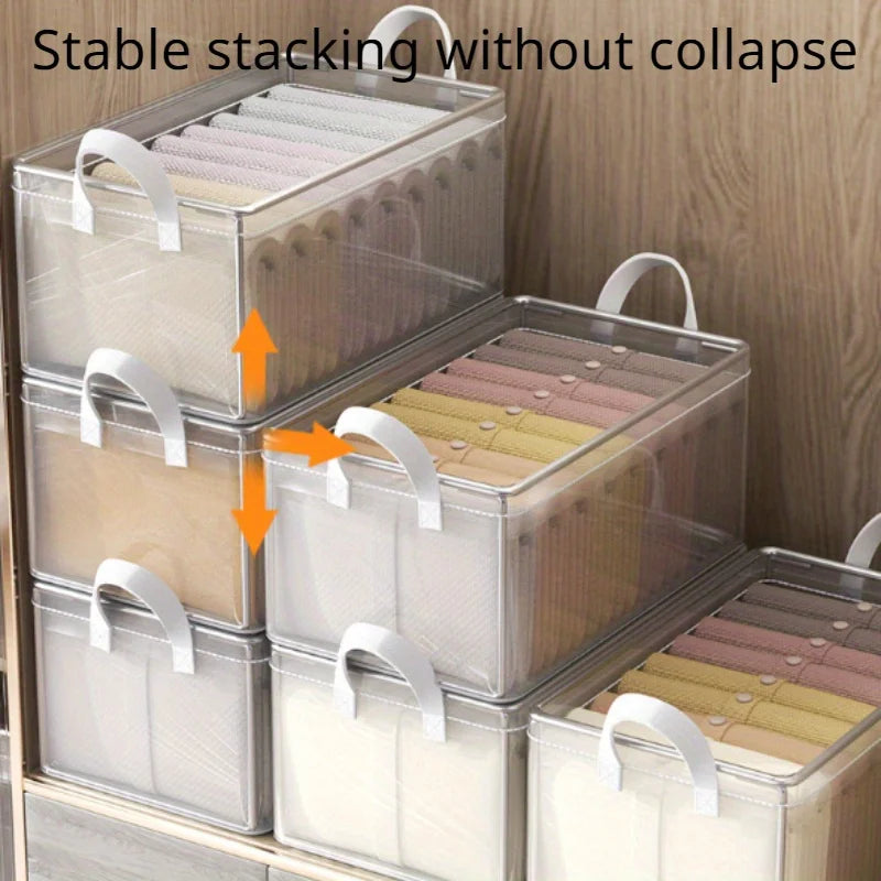 Stackable storage bins with clear lids on a wooden surface