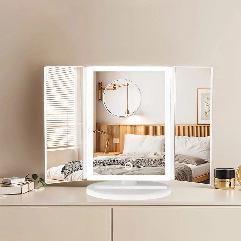 Modern vanity mirror with lighted display on a neutral-colored wall.