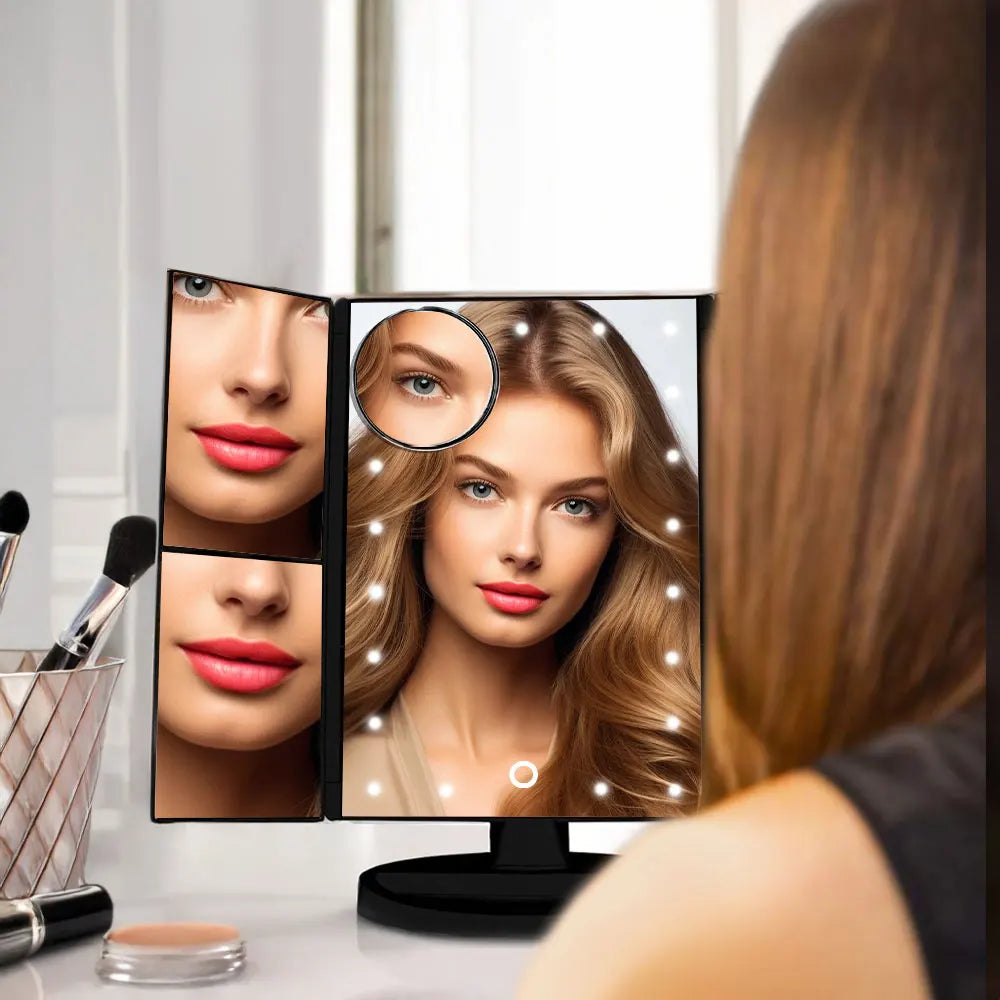 Woman using a makeup mirror with multiple screens and lights
