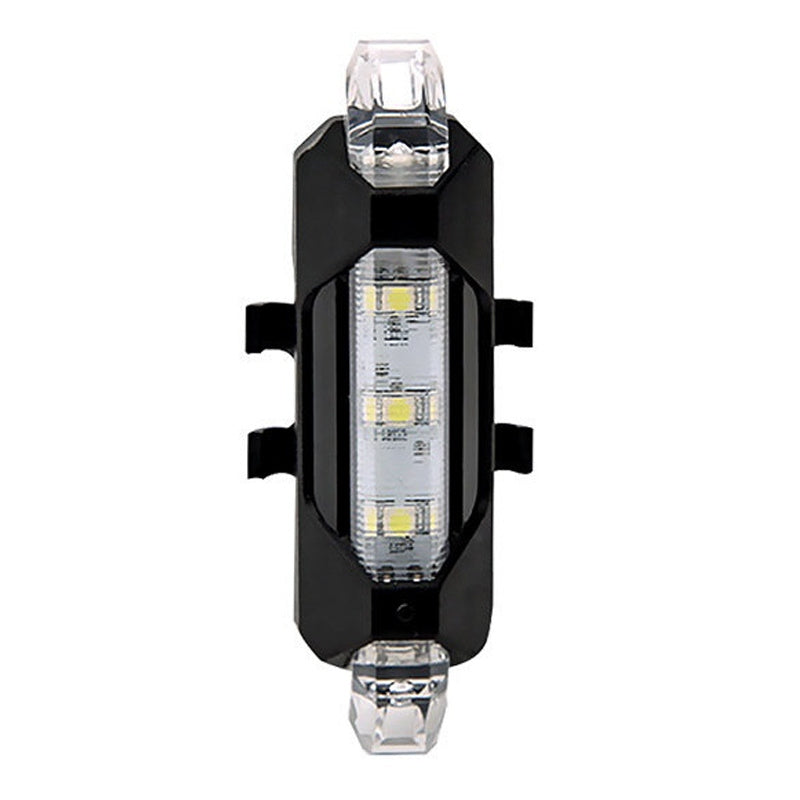 Black bike light with clear lens on a white background