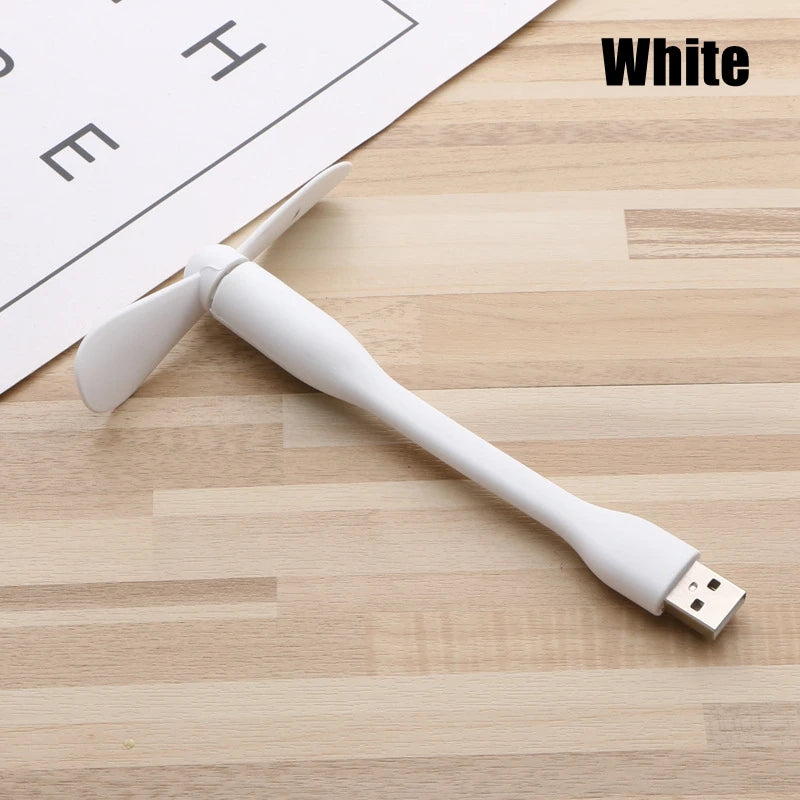 White USB cable on a wooden surface with 'White' text above