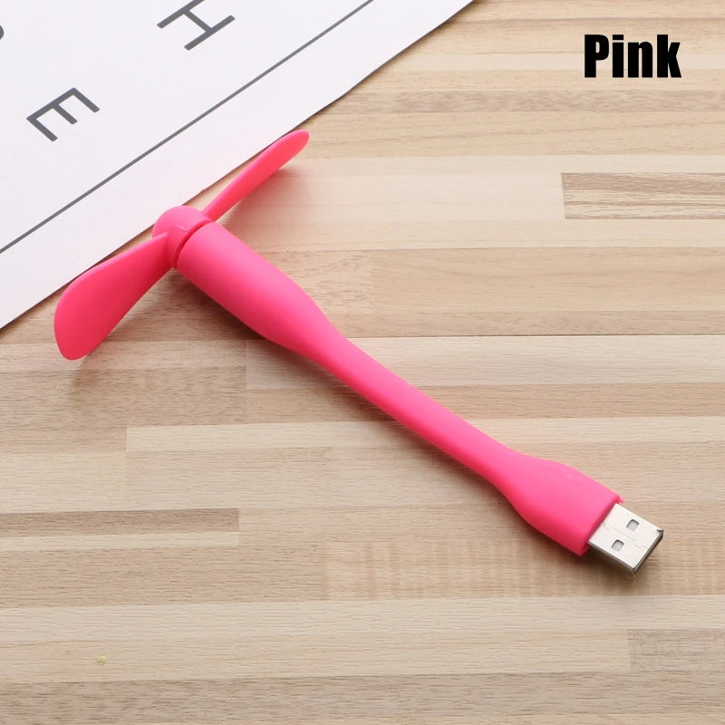 Pink USB cable on a wooden surface with 'Pink' text overlay