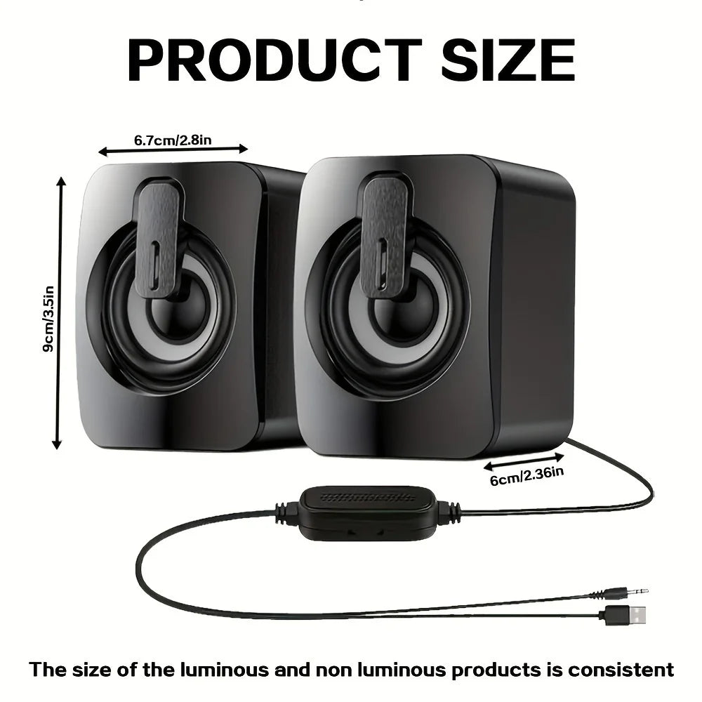 Black speakers with USB cable and measurement details on a white background