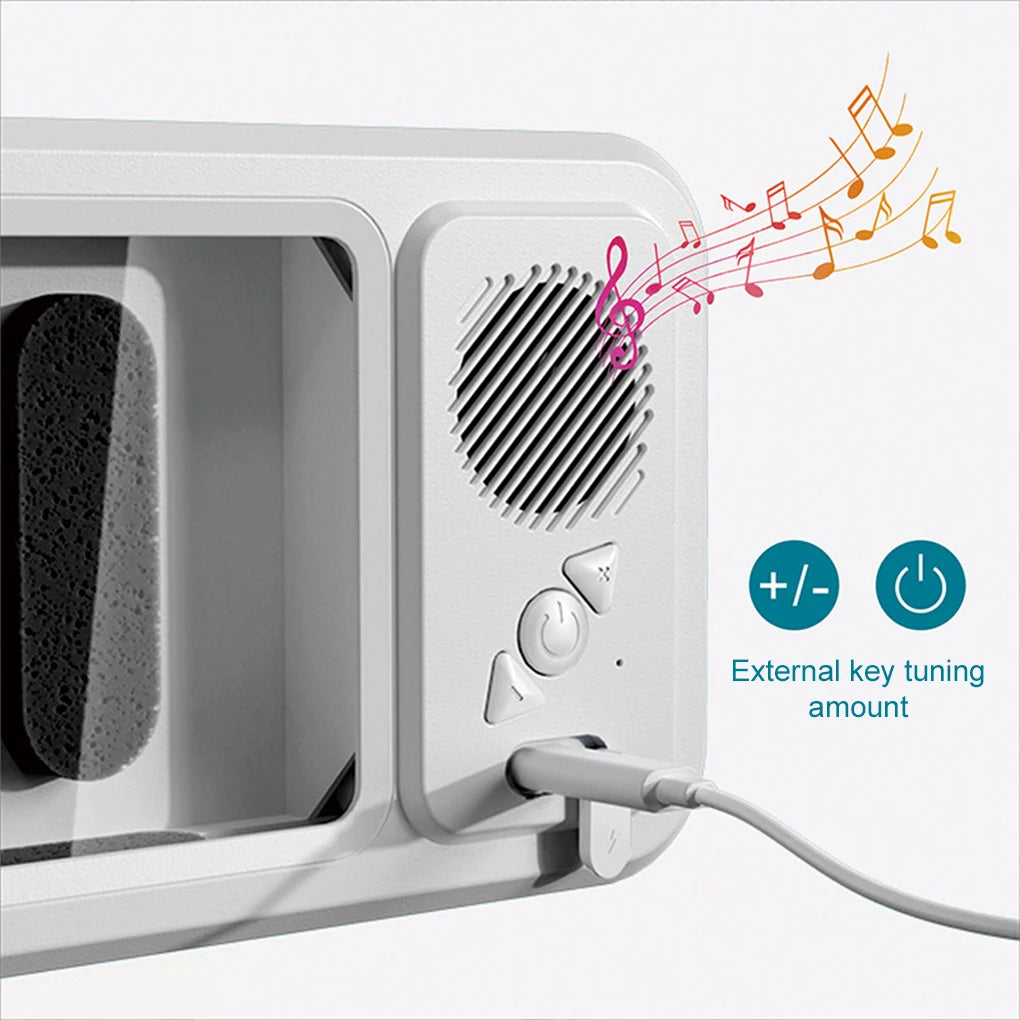White electronic device with speaker and control buttons on a white background
