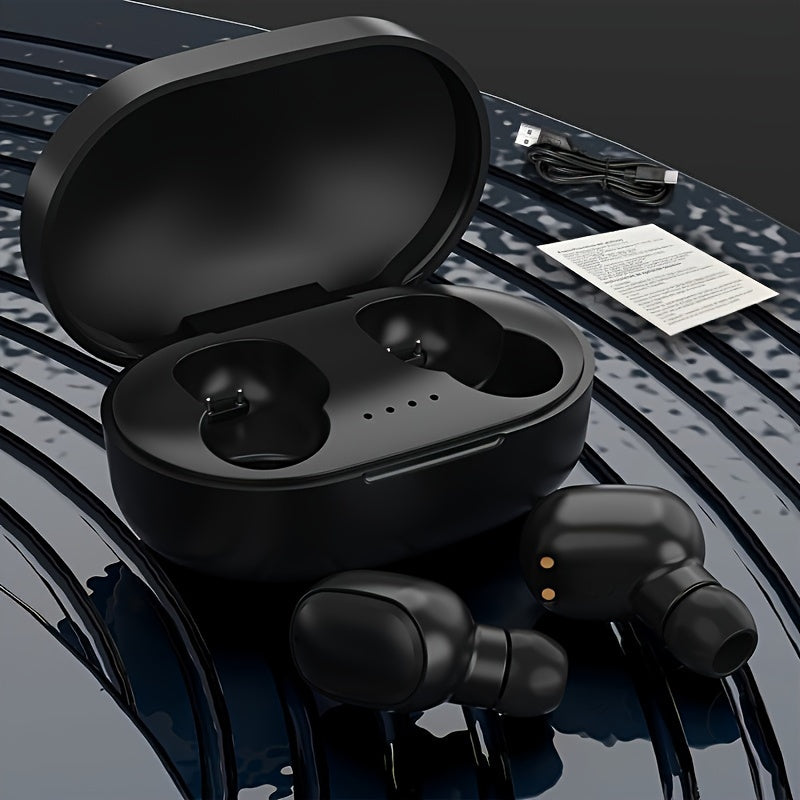 Black wireless earbuds with charging case on a reflective surface