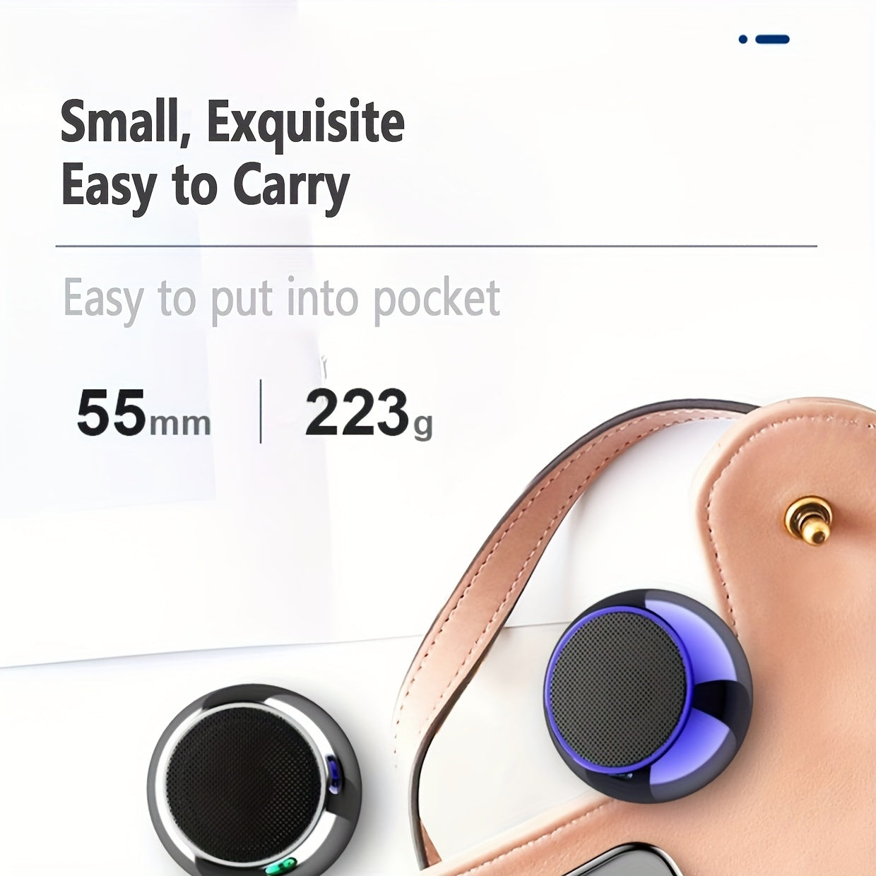 Close-up of a small electronic device with text highlighting its portability.