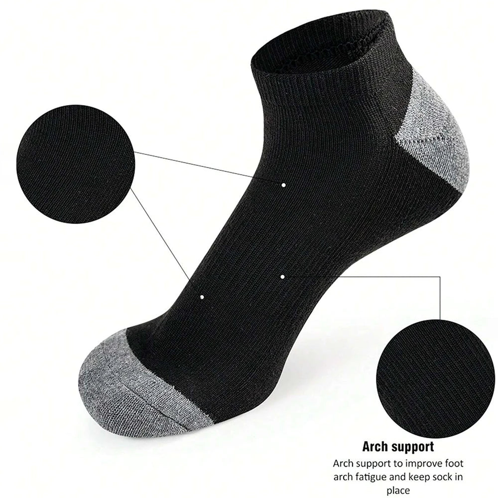 Black ankle sock with gray arch support on a white background
