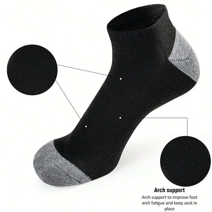 Black ankle sock with gray arch support on a white background