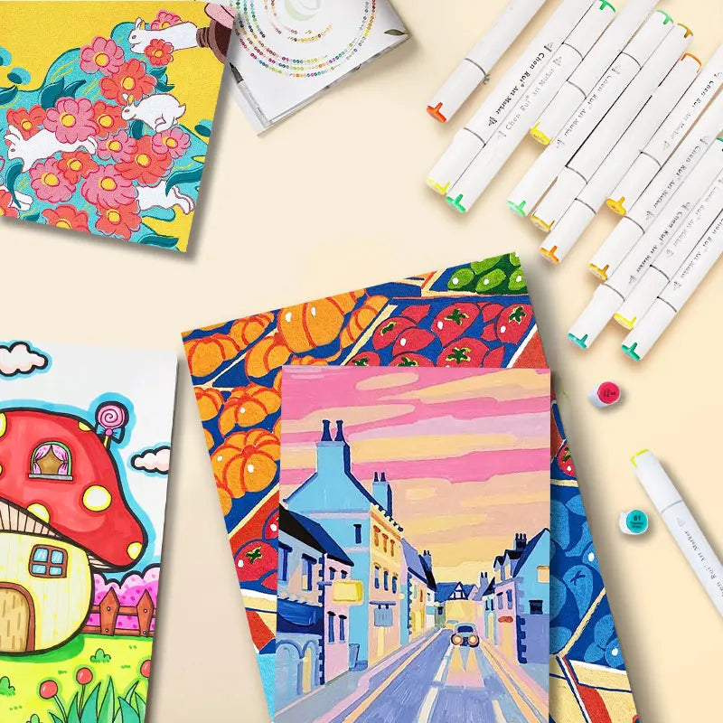 Colorful art supplies including markers and paper with artistic designs on a light beige background.