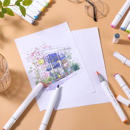 Coloring book with a house illustration on a table with markers and glasses