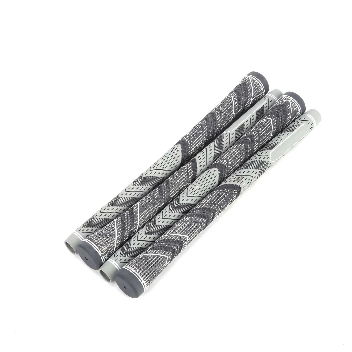 Four gray and white patterned golf club grips on a white background