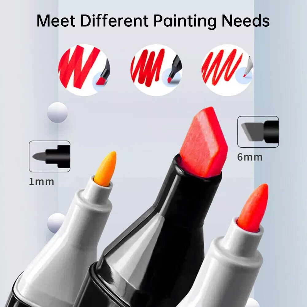 Set of paint markers with different tip sizes on a gray background
