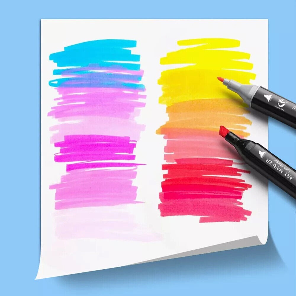 Color swatches on a piece of paper with a black marker on a blue background