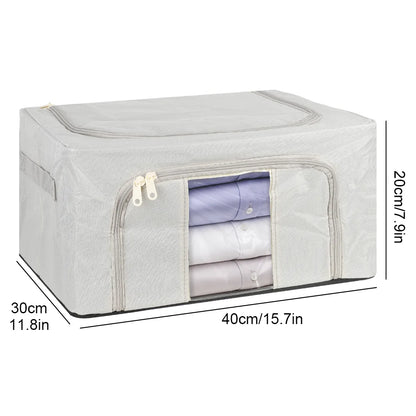 Gray storage box with a clear window showing folded clothes, dimensions indicated.