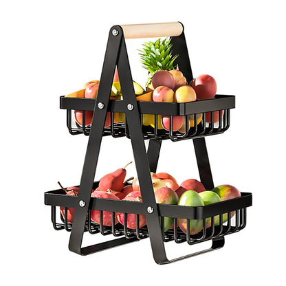 Black two-tiered fruit basket with fruits on a white background