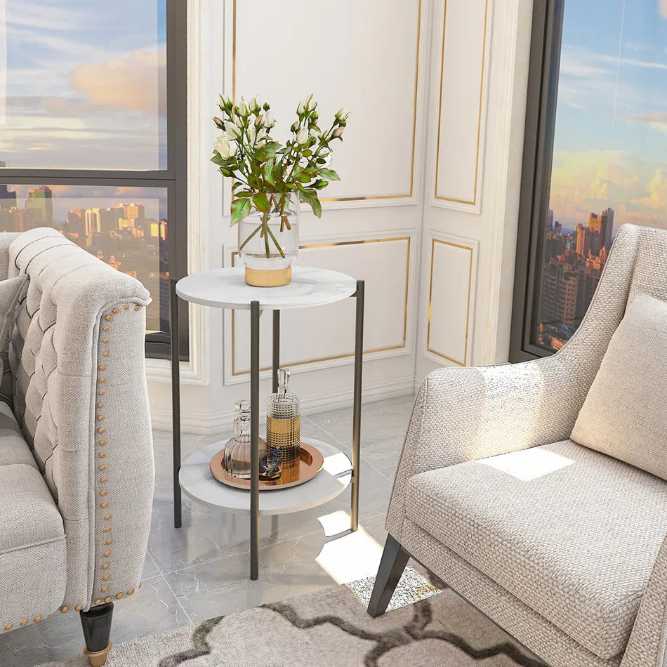 Modern living room with gray sofa, armchair, and decorative table.
