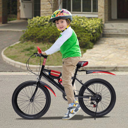 Child on a bicycle wearing a helmet in an outdoor setting