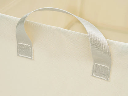 Close-up of a beige fabric with a white strap and mesh patch on a beige background