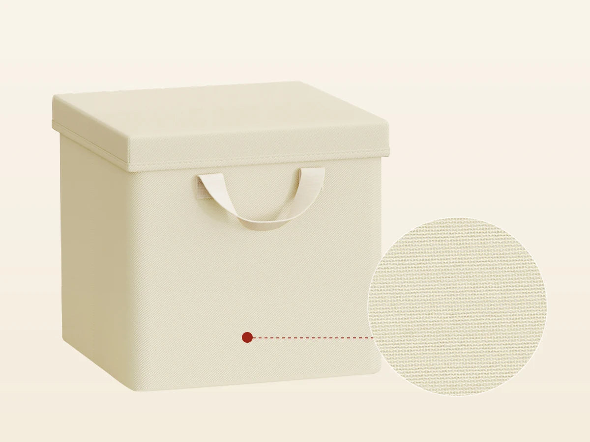 Beige storage box with a handle on a light beige background