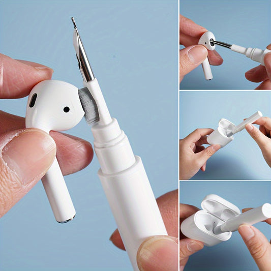 White earbud cleaning tool with brush and nozzle, held by a hand against a light blue background.