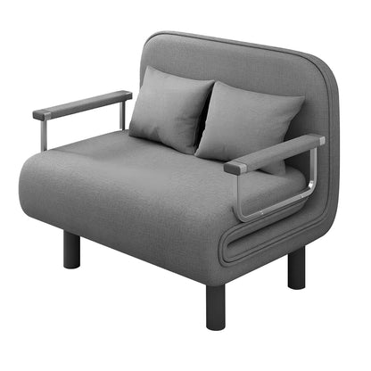 Gray sofa bed with armrests and two pillows on a white background