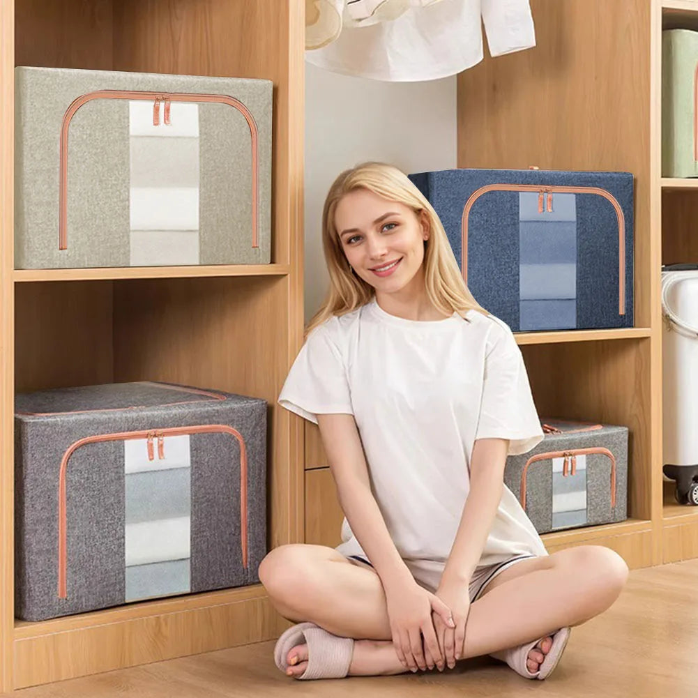 Woman sitting on the floor with storage boxes in a room with wooden shelves.