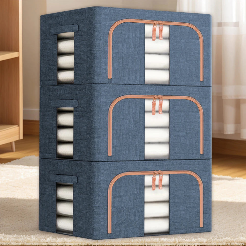Stack of blue storage boxes with white contents on a carpeted floor.