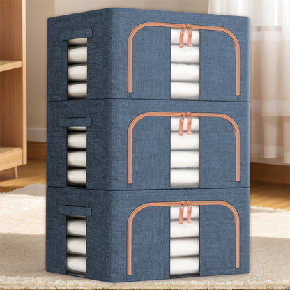 Stack of blue storage boxes with white contents on a carpeted floor.