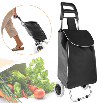Black shopping cart with wheels on a white background, surrounded by vegetables.