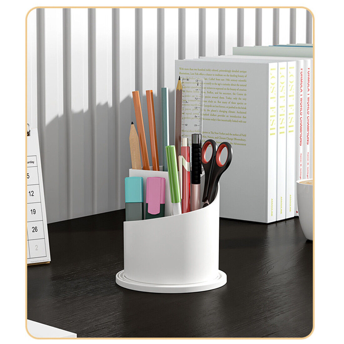 White desk organizer with stationery items on a dark surface with books in the background