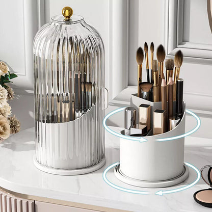 Makeup brush holder with decorative elements on a vanity table.