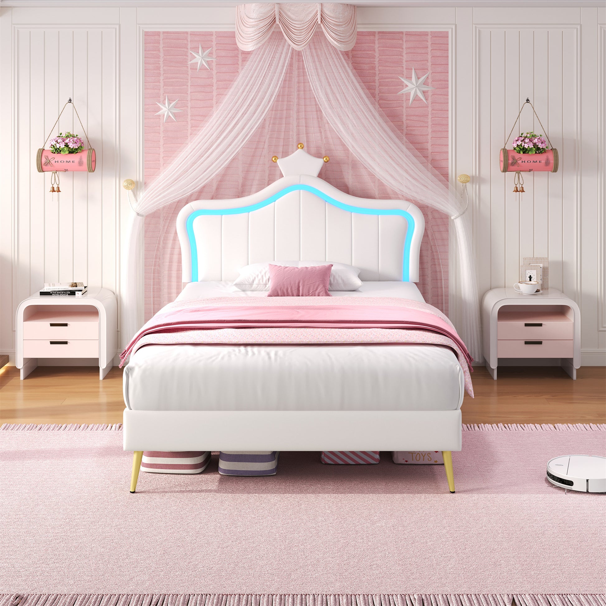 Pink and white bedroom with a canopy bed and decorative elements.