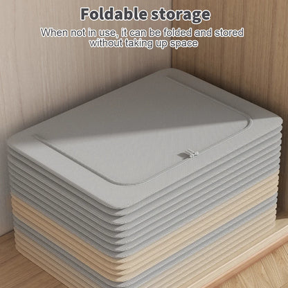 Stack of gray and beige folded storage mats on a wooden shelf.