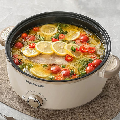 Crockpot with fish and vegetables on a textured surface